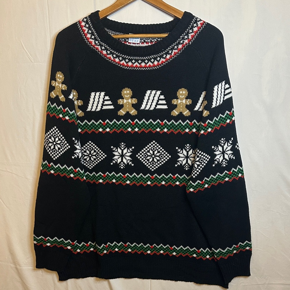 Festive Black Crewneck Sweater with Gingerbread and Snowflake Design  ALDI 2024